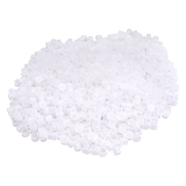 500 capuchons d'encre blancs pour tatouage Capuchons d'encre blancs empilés sur fond blanc
