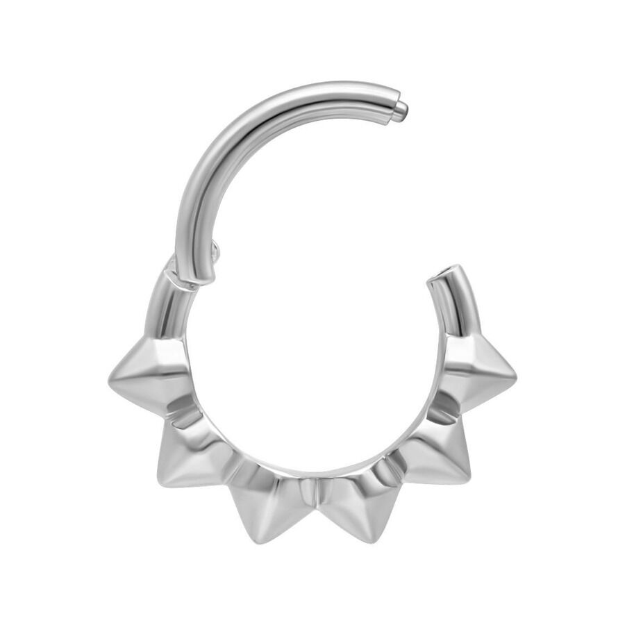 Clicker à pointes en argent pour piercing Clicker à pointes en argent pour piercing en acier chirurgical sur fond blanc
