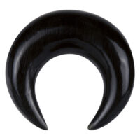 Croissant d'Étirement Noir en Corne Croissant noir en corne pour piercings d'oreille sur fond blanc