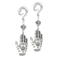 Poids d'oreilles Hamsa en argent et or Deux poids d'oreilles Hamsa en argent et or avec crochet sur fond blanc
