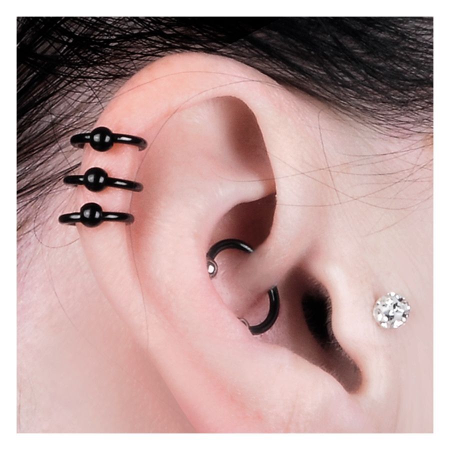 Clous d'oreilles noirs en acier chirurgical Oreille avec clous d'oreilles noirs en acier chirurgical et petit cristal