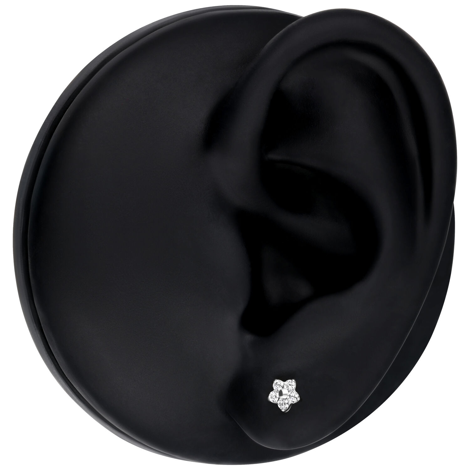 Embout fleur en argent avec pierre cristalline sur modèle d'oreille noir