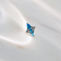 Embout Cristal Push Fit Argent, Turquoise Embout Push Fit argenté avec cristal turquoise sur fond clair