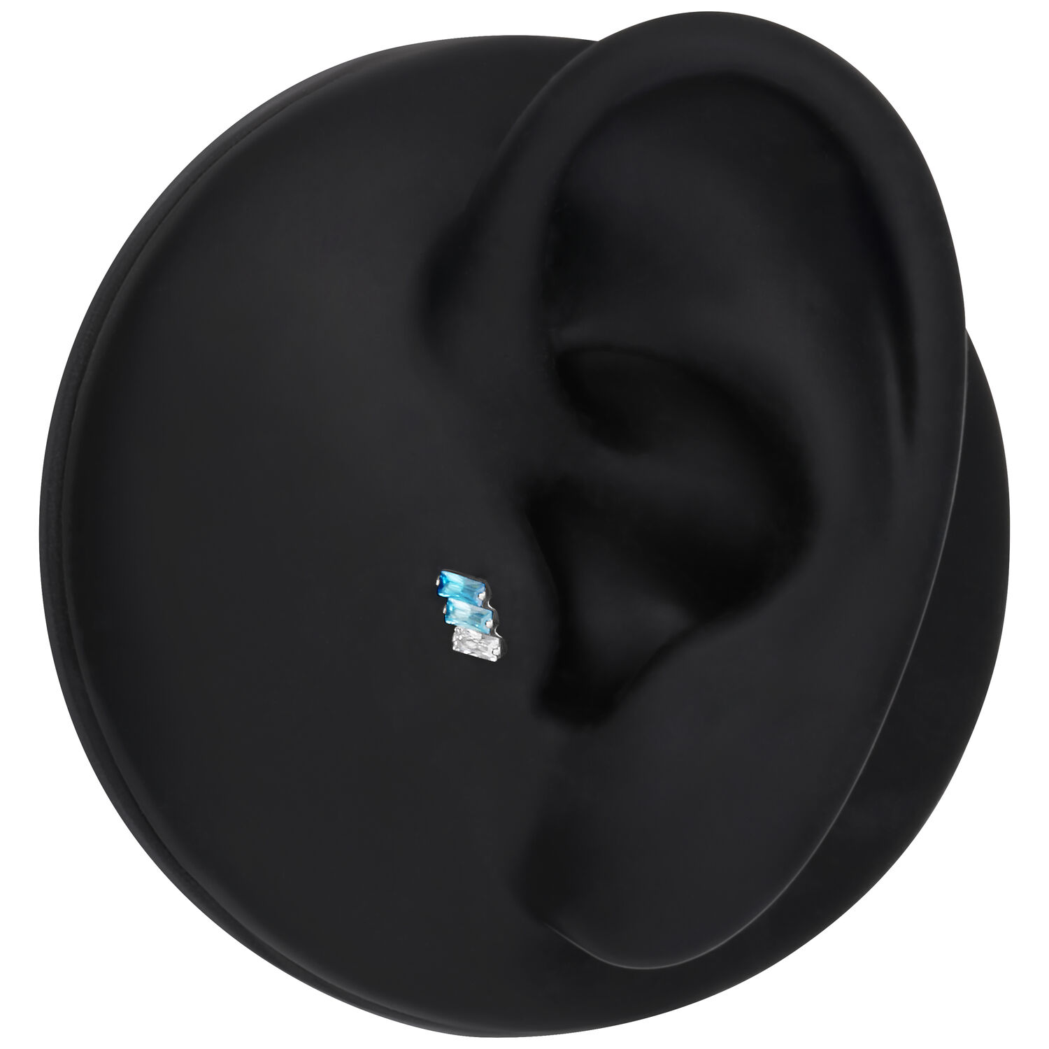 Embout Push Fit en Cristal Lavande et Turquoise Embout Push Fit argenté avec cristaux lavande et turquoise sur un modèle d'oreille noir
