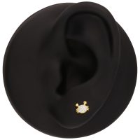 Embout Crabe Doré Push Fit Embout crabe doré avec pierres scintillantes sur un modèle d'oreille noire