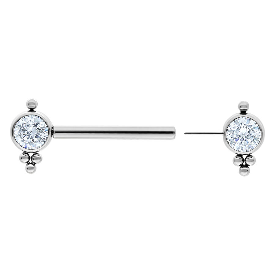 Barbell en titane argenté avec cristaux Barbell argenté en titane avec deux cristaux clairs sur fond blanc.