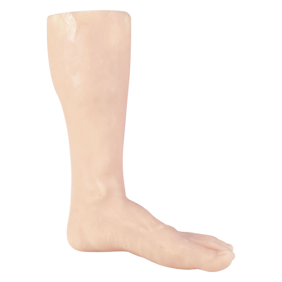 Jambe d'entraînement pour tatouage en silicone, gauche, beige Jambe en silicone beige pour tatouage sur fond blanc