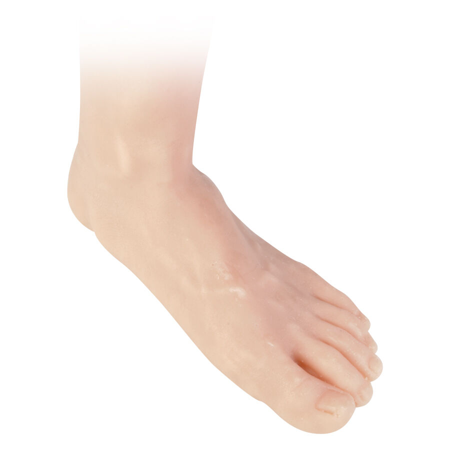 Peau d'entraînement tatouage jambe gauche en beige Jambe en silicone beige pour entraînement au tatouage sur fond blanc