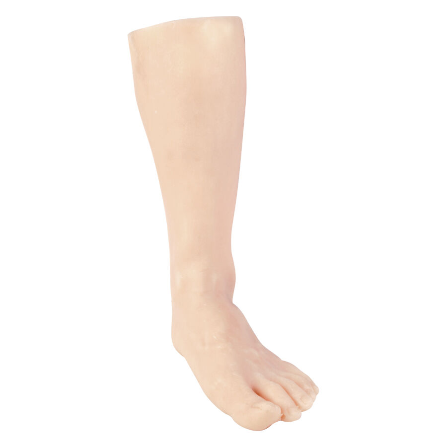 Jambe en silicone pour exercices de tatouage, gauche Jambe en silicone beige pour pratique du tatouage sur fond blanc