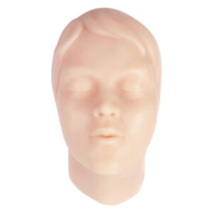 Forme de visage en silicone beige pour entraînement de tatouage sur fond blanc