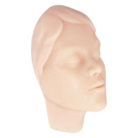 Peau d'entraînement pour tatouage visage de femme silicone beige Modèle en silicone beige d'une tête de femme pour exercices de tatouage, allongé sur le côté