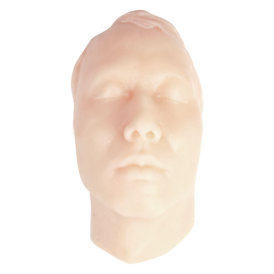 Peau d'entraînement pour tatouage visage en silicone beige Modèle en silicone beige d'un visage masculin sur fond blanc