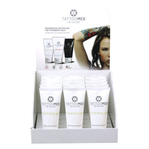 TattooMed Cleansing Gel en tube blanc dans un présentoir avec plusieurs tubes