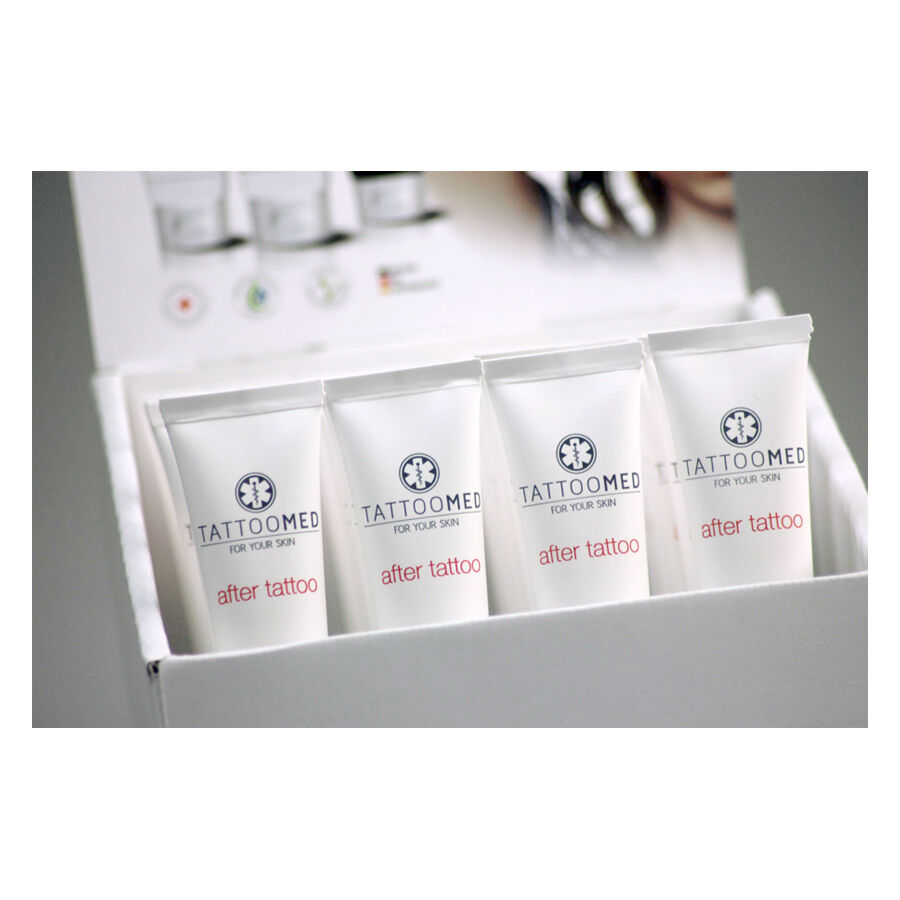 TattooMed® After Tattoo Crème de Soin 100 ml Quatre tubes de crème TattooMed® After Tattoo en emballage blanc