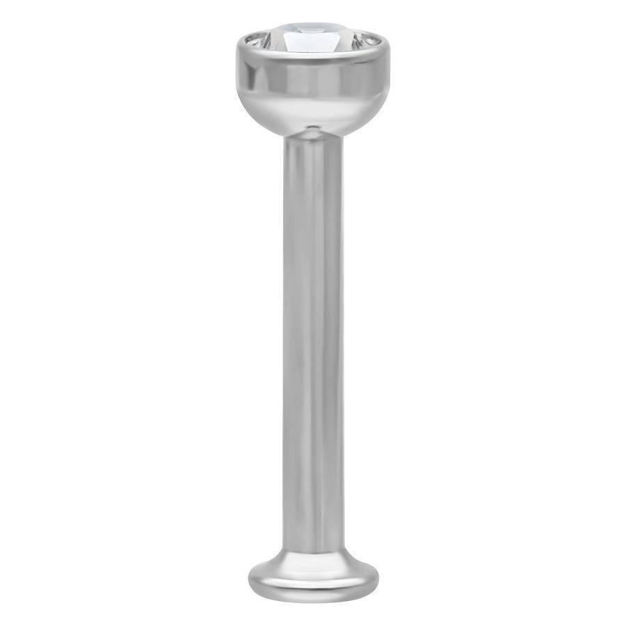 Mini labret en titane avec cristal clair Mini labret en titane argenté avec cristal clair sur fond blanc