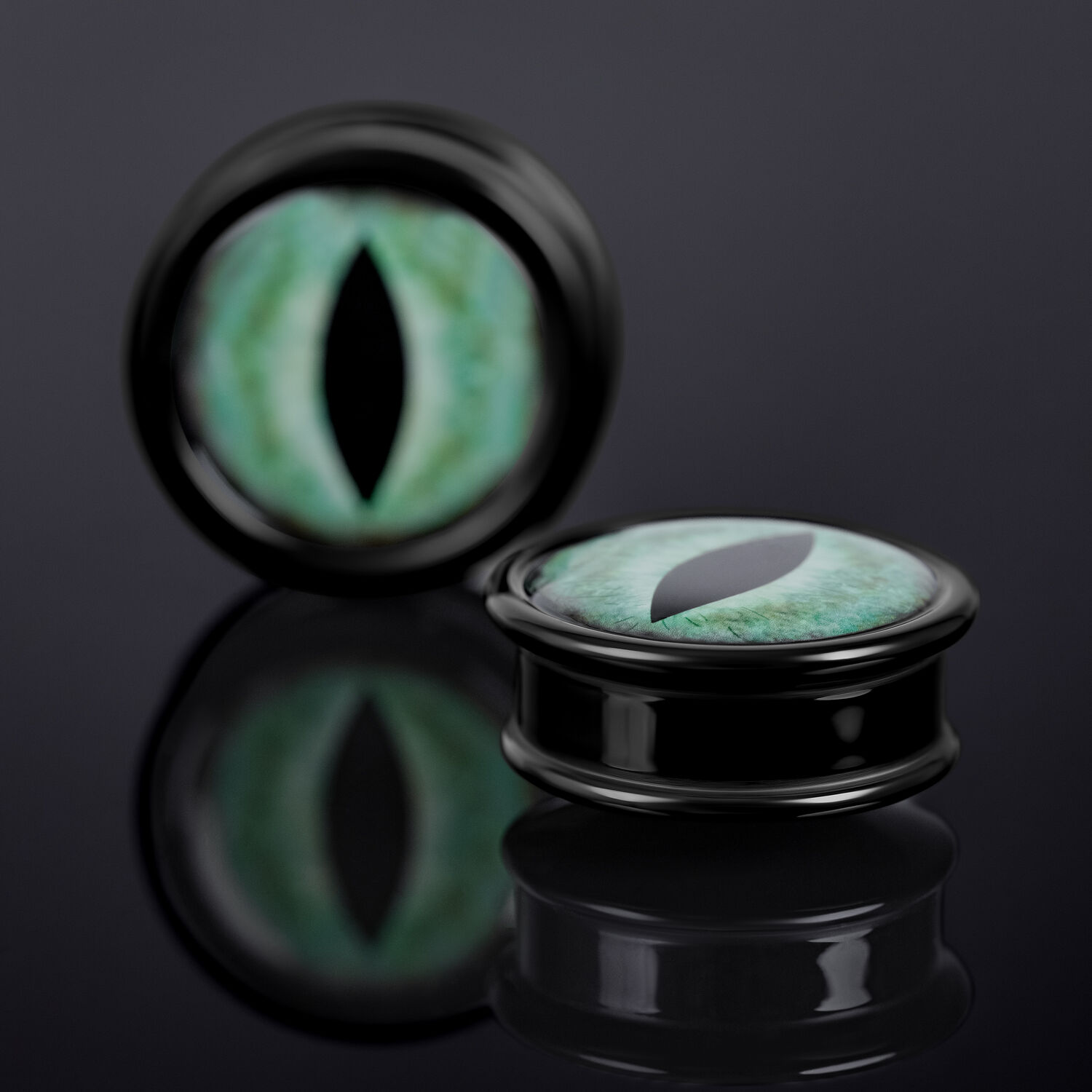 Verena Venus Plug avec œil de chat vert Plug noir avec design œil de chat vert sur fond sombre