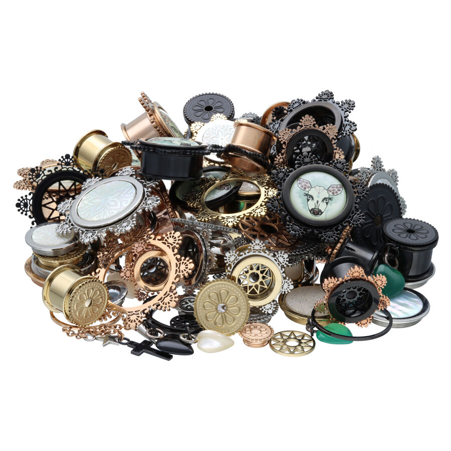 X-Change Ultra Set en acier chirurgical Différents ensembles de piercings en acier chirurgical 316L en or, noir et argent sur fond blanc