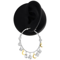 Celestial Hoops en argent et or Boucles d'oreilles pendantes en argent et or sur un présentoir noir