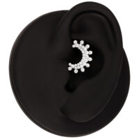 Clicker de septum argenté avec cristaux Clicker de septum argenté avec cristaux scintillants, présenté sur fond noir