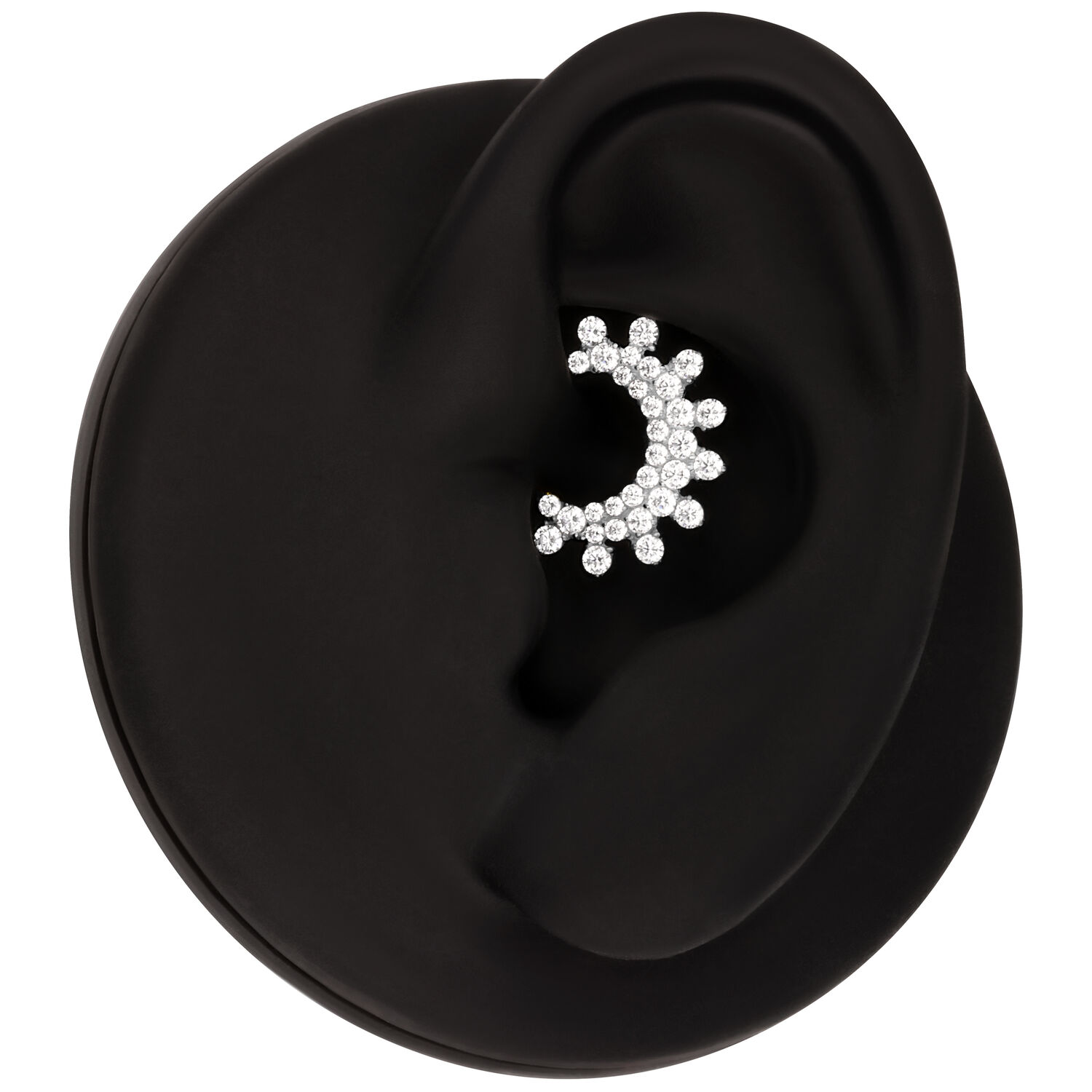 Clicker de septum argenté avec cristaux Clicker de septum argenté avec cristaux scintillants, présenté sur fond noir