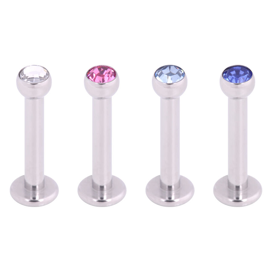 Labret avec cristal en argent et bleu Quatre labrets argentés avec des cristaux clairs, roses et bleus sur fond blanc