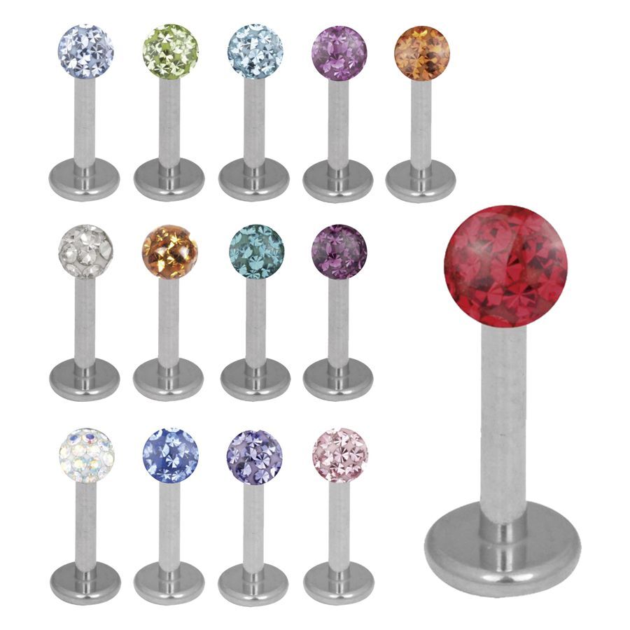 Labret en titane argenté avec cristaux Labret argenté en titane avec différentes couleurs de cristaux sur fond blanc