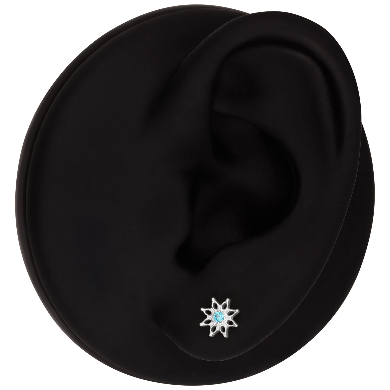 Embout Aqua Bloom Cristal Turquoise Modèle d'oreille noir avec embout fleur en cristal turquoise dans le lobe
