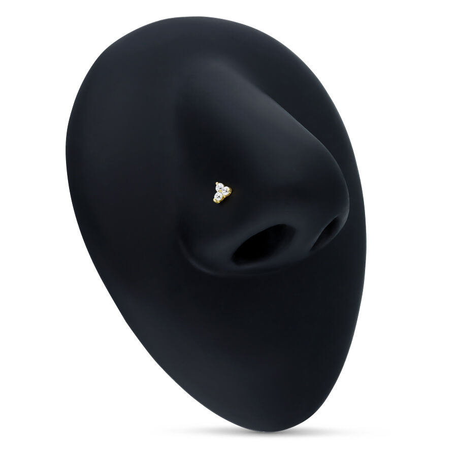 Clou de nez en or 18k avec cristaux Clou de nez en or avec trois cristaux clairs sur fond noir